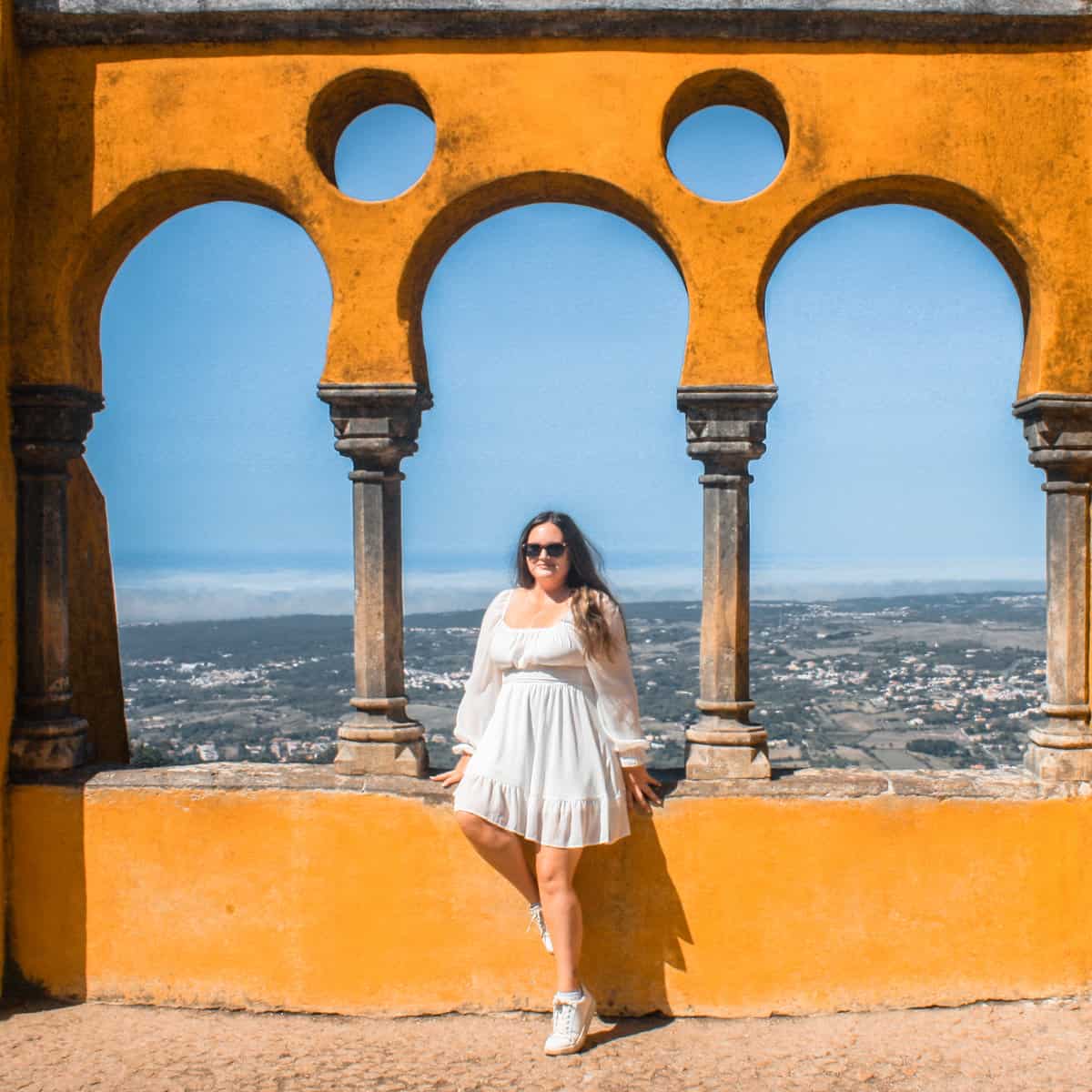 Posing for an Instagram photo at Sintra's Pena Palace. 