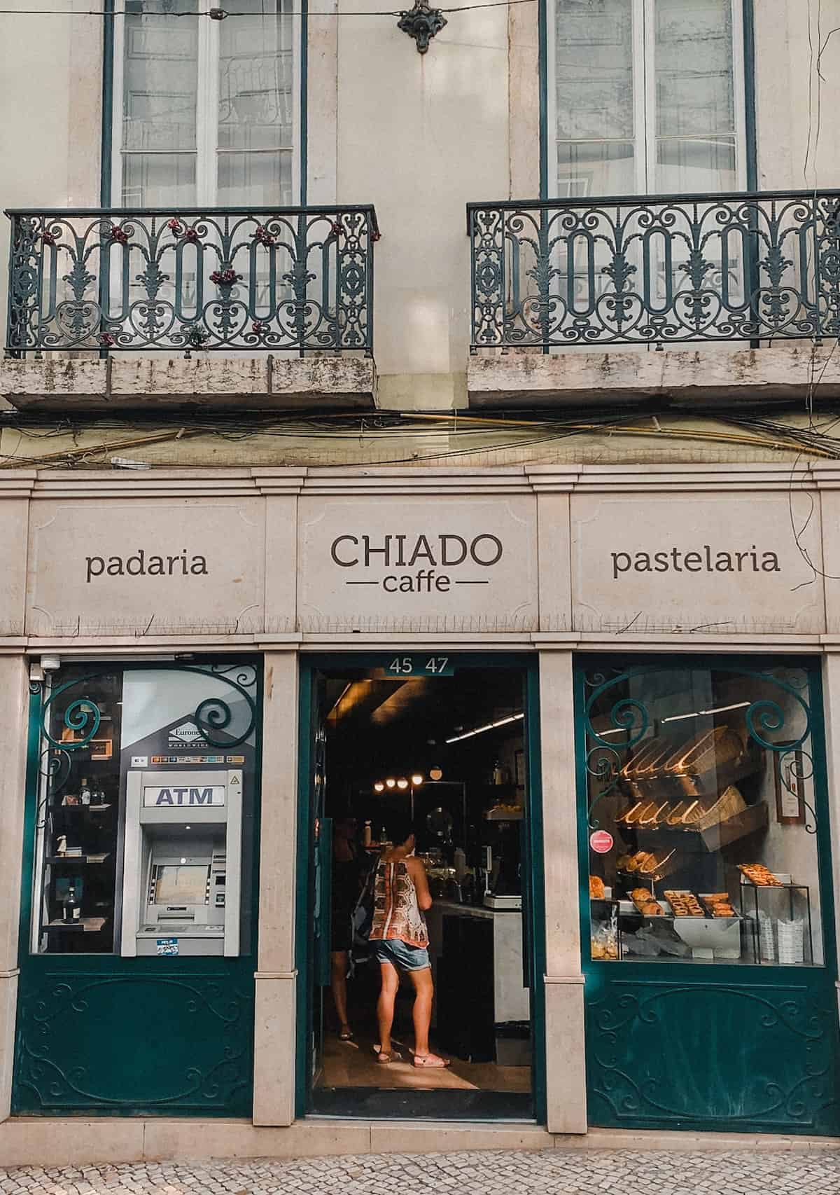 Exterior of Chiado Cafe in Lisbon. Teal exterior.