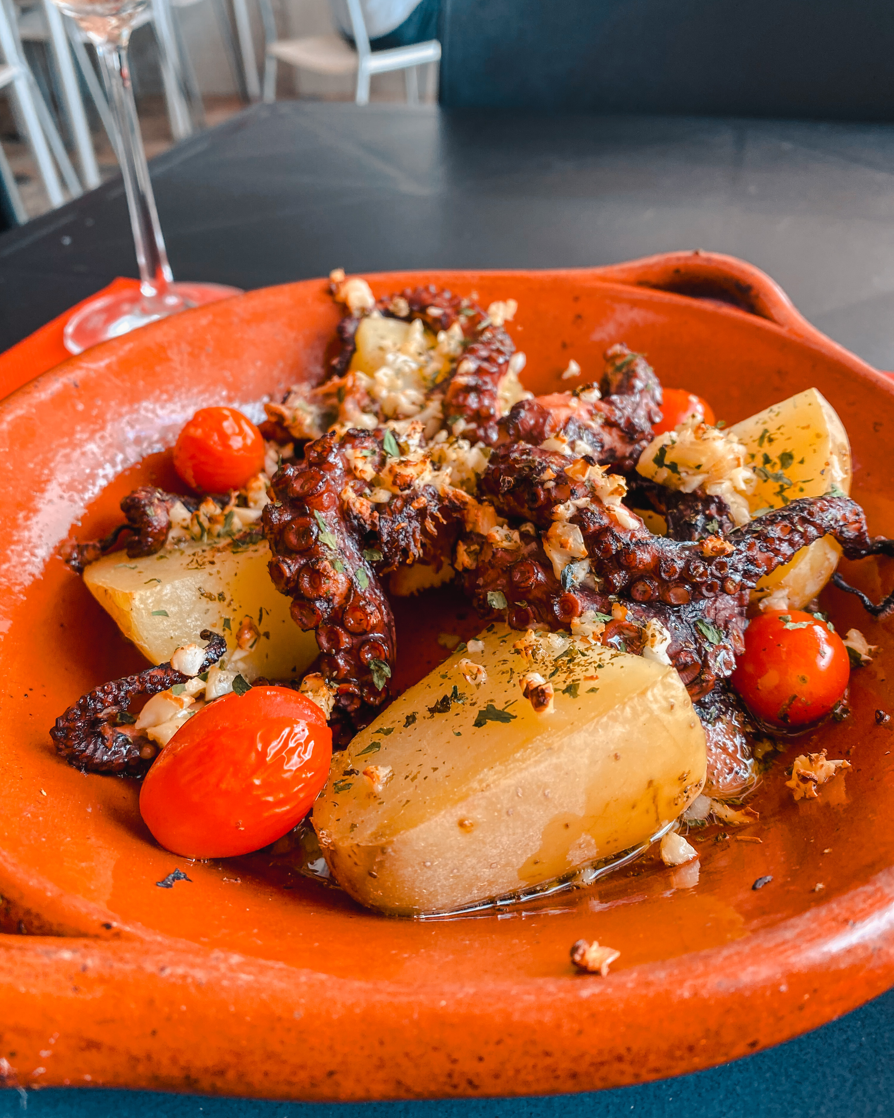 Polvo a Lagareiro, Portuguese dish with octopus, potatoes, garlic, and olive oil