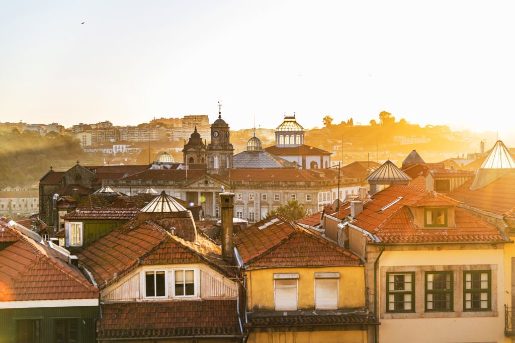 sun over porto rooftops