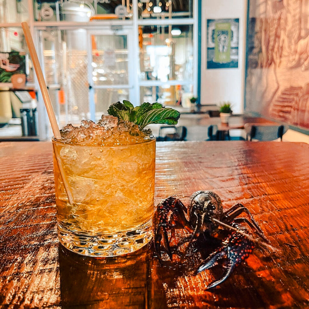 mint julep with spider decoration for halloween