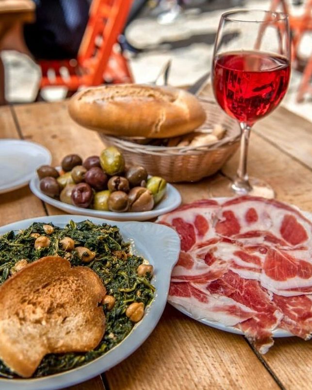 spanish tapas on table to share at a food tour