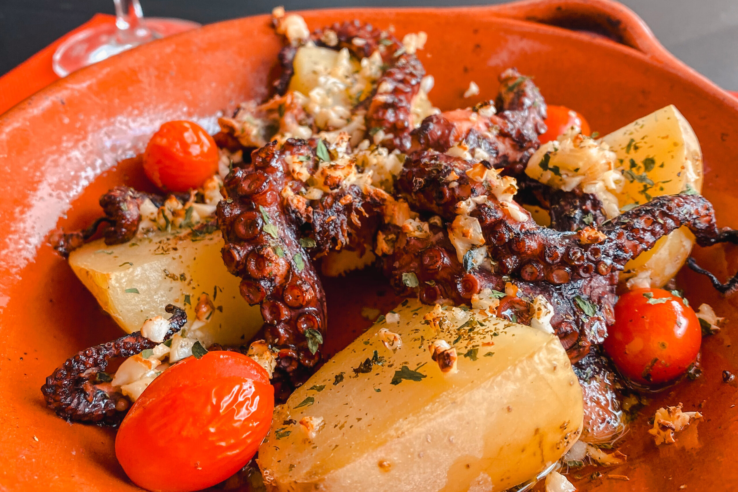 Polvo a Lagareiro, Portuguese dish with octopus, potatoes, garlic, and olive oil