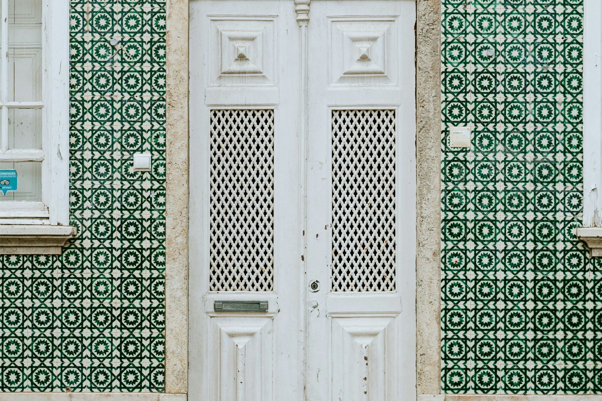 doorway in faro covered with portuguese tiles