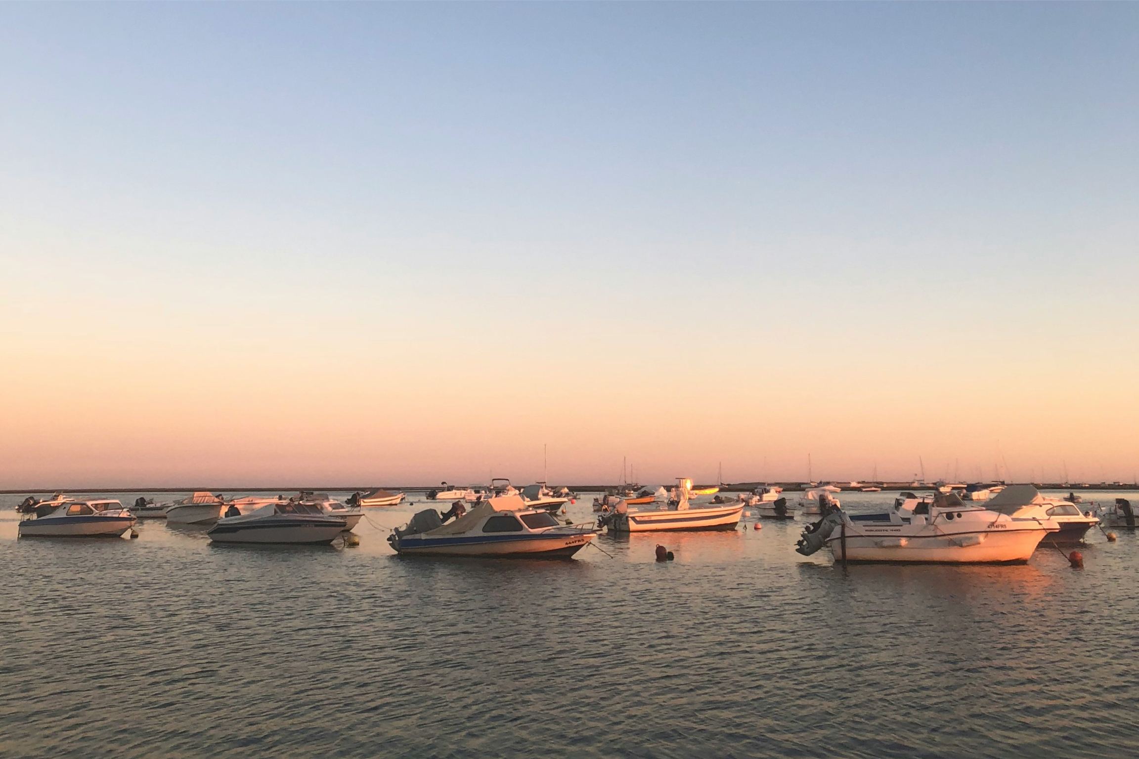 boats off algarve coast