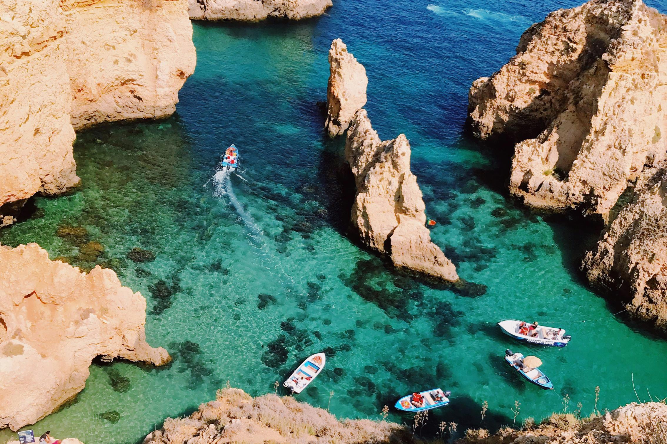 boats in algarve cove