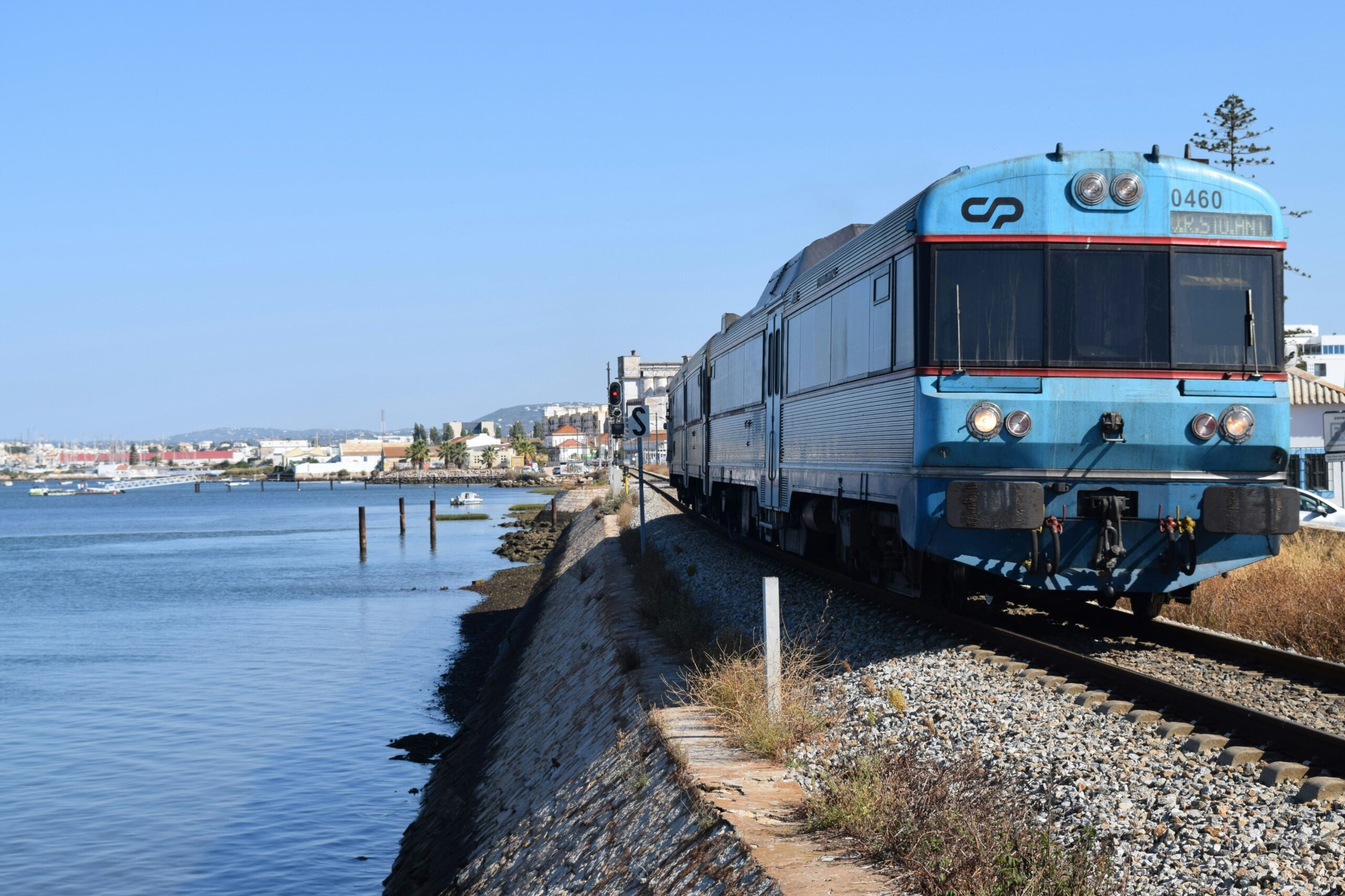 train traveling through algarve towns